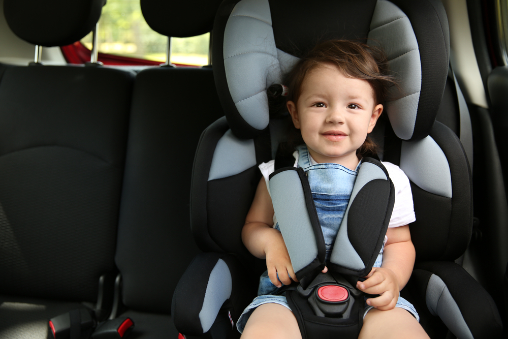 child in car seat following Alabama car seat laws