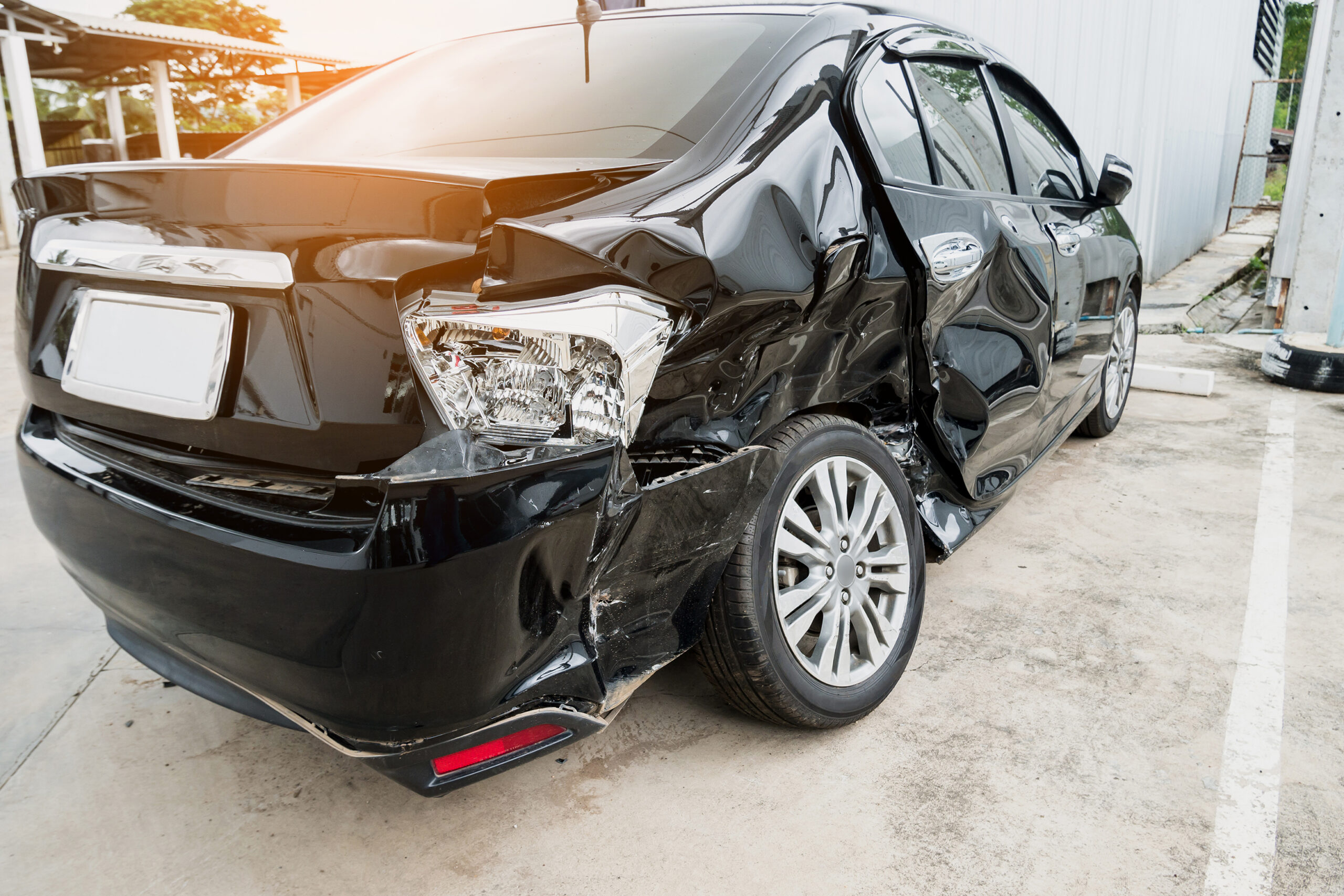 Crunched side of a vehicle as featured image for an article on vehicle property damage lawyer insights