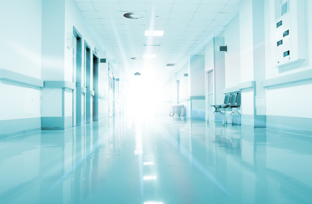 empty corridor in hospital to underscore question of who pays hospital bills after a car accident